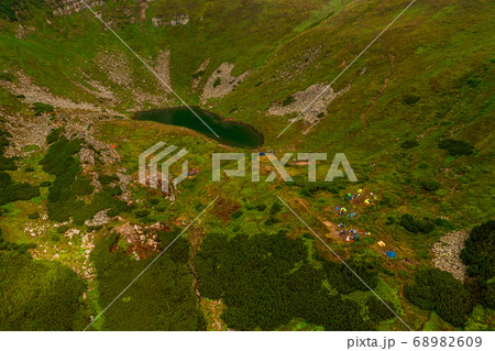 Carpathian lake Brebeneskul and rocky terrain near 68982609