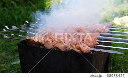 Cooking shashlik, shish kebab 68983425