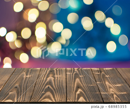 Wooden Table Mock Up with Garland Bokeh Circles Wooden Table Mock Up with Garland Bokeh Circles 68985355
