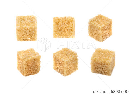 Raw Brown Cane Sugar Cubes Isolated on White Raw Brown Cane Sugar Cubes Isolated on White 68985402