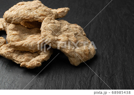 Raw Dehydrated Soy Meat or Soya Chunks on Black Raw Dehydrated Soy Meat or Soya Chunks on Black 68985438