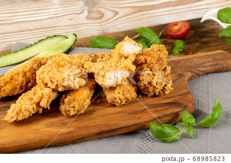 Breaded Deep Fried Fish Nuggets on Wooden Rustic 68985823