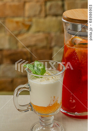 Fresh dessert with white chocolate in a 68986903