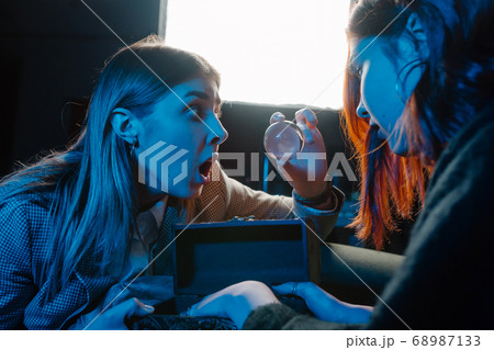 Woman and woman fortune teller with crystal ball 68987133