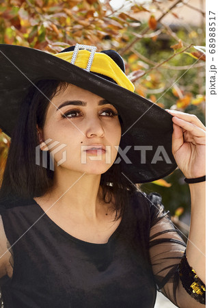 Woman in a witch costume Woman in a witch costume 68988517
