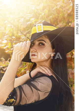Woman in a witch costume Woman in a witch costume 68988525