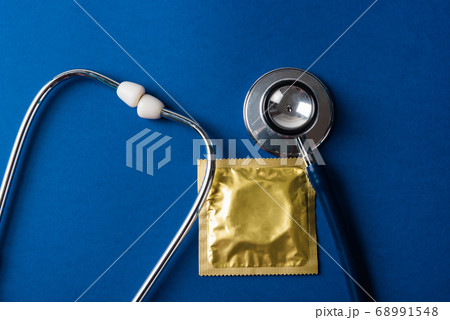 medical equipment, condom in pack and stethoscope medical equipment, condom in pack and stethoscope 68991548