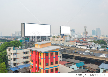 Mockup image of Blank billboard white screen posters in the city on road for advertising background 68993303