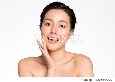 Beautiful Young asian Woman with Clean Fresh Skin, on white background, Face care, Facial treatment 68994555