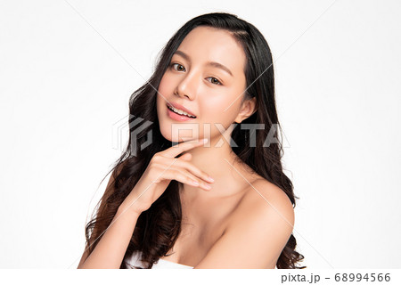 Beautiful Young asian Woman with Clean Fresh Skin, on white background, Face care, Facial treatment Beautiful Young asian Woman with Clean Fresh Skin, on white background, Face care, Facial treatment 68994566
