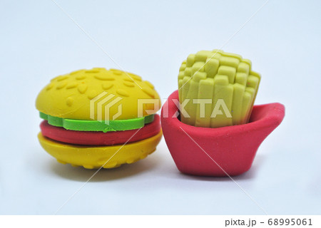 Selected focused of burger and french fries made from colorful toy soft rubber isolated on white background.  68995061