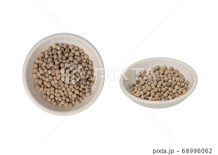 Bowl of Peppercorns (white pepper) isolated on white Bowl of Peppercorns (white pepper) isolated on white 68996062