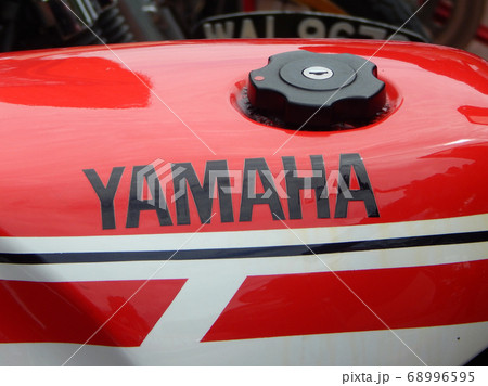SERDANG, MALAYSIA -JULY 29, 2017: YAMAHA logos at the motorcycle body. YAMAHA is one of the famous motorcycles manufactures in the world.    68996595
