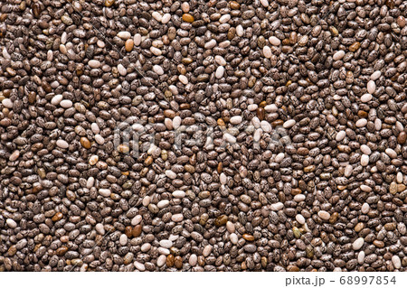 Texture of chia seeds closeup. Texture of chia seeds closeup. 68997854