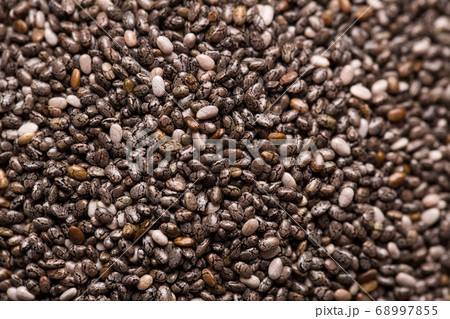 Texture of chia seeds closeup. Texture of chia seeds closeup. 68997855