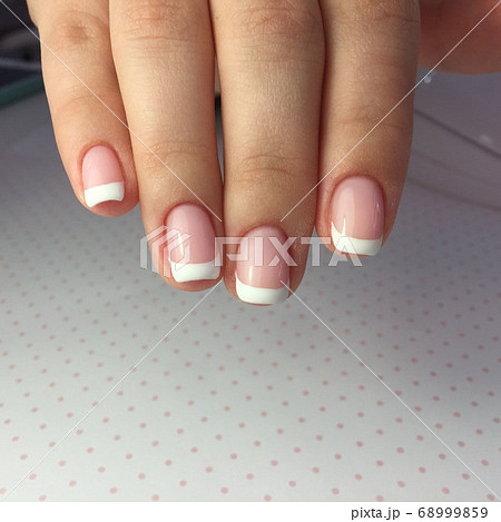 French manicure on the nails. French manicure 68999859