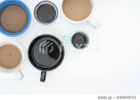 Many cups of coffee on table flat lay copy space. Many cups of coffee on table flat lay copy space. 69004032