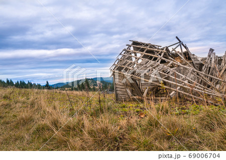 Ruined building in the middle of mountain, 69006704