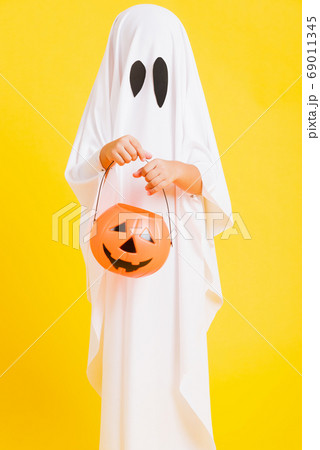 little cute child with white dressed costume little cute child with white dressed costume 69011345
