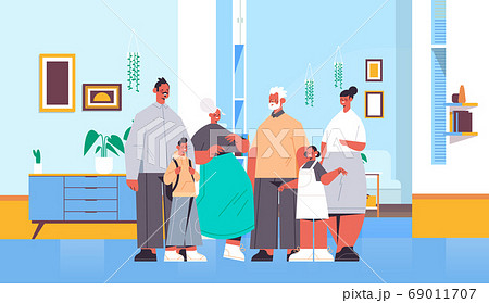 multi generation family happy grandparents parents and children standing together 69011707