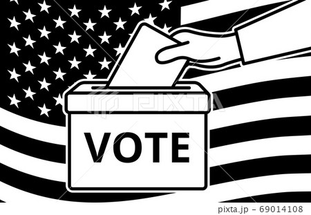 Voters hand putting envelope in ballot box 69014108