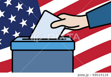 Voters hand putting envelope in ballot box 69014119