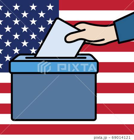 Voters hand putting envelope in ballot box 69014121