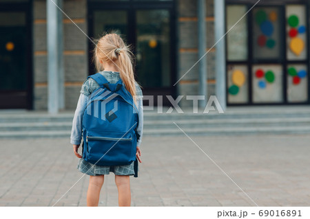 Cute little girl with backpack going back to school Cute little girl with backpack going back to school 69016891