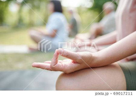 Meditating at group class 69017211