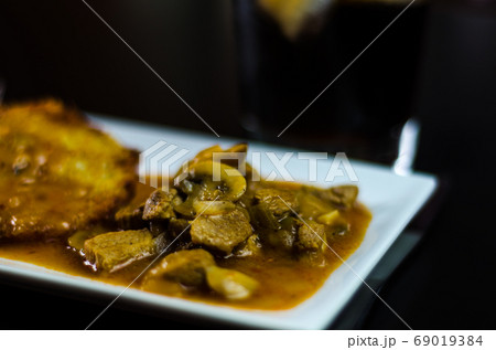 potato pancakes with spicy stew, delicious potato pancakes with spicy stew, delicious 69019384