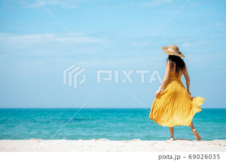 Summer vacations. Lifestyle woman relax and chill on beach background. Summer vacations. Lifestyle woman relax and chill on beach background. 69026035