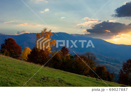 autumnal rural landscape at dusk. beautiful countryside in mount autumnal rural landscape at dusk. beautiful countryside in mount 69027887