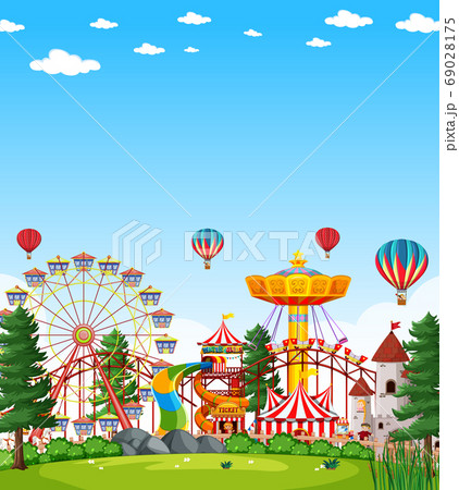 Amusement park scene at daytime with blank bright Amusement park scene at daytime with blank bright 69028175