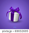 gift box with red bow 69032695