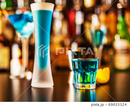 refreshing liqueur in a tall glass, alcoholic refreshing liqueur in a tall glass, alcoholic 69033324