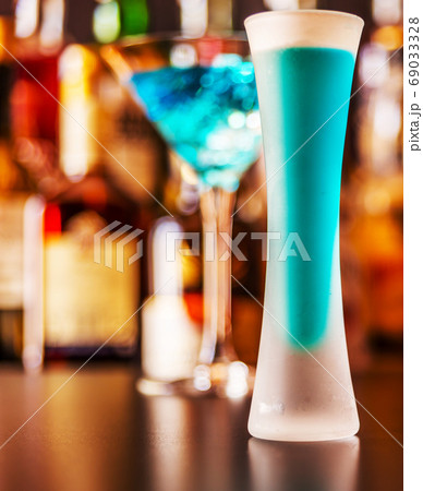 refreshing liqueur in a tall glass, alcoholic 69033328