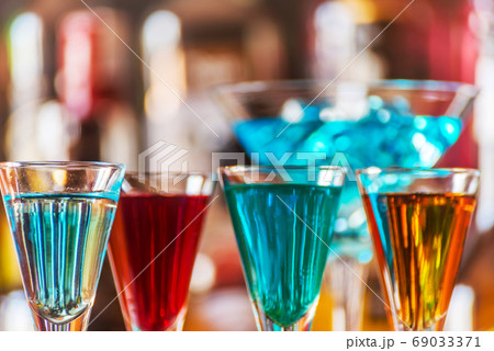 refreshing liqueur in a tall glass, alcoholic 69033371