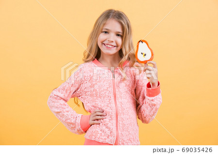 Little girl smile with lollipop, snack 69035426