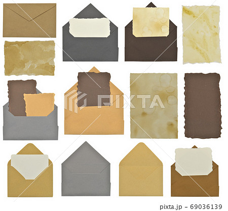 Design set with old envelopes and ancient sheet of paper blank with texture. Post mock up and template concept with copy space. Collection of vintage objects isolated on white background Design set with old envelopes and ancient sheet of paper blank with texture. Post mock up and template concept with copy space. Collection of vintage objects isolated on white background 69036139