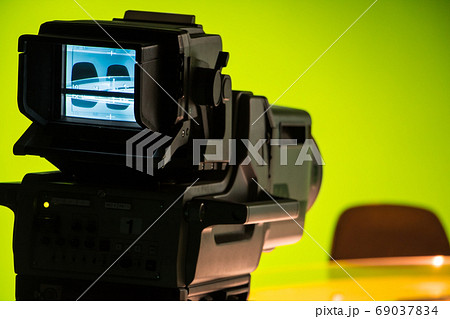 TV studio with professional camera aiming at empty 69037834