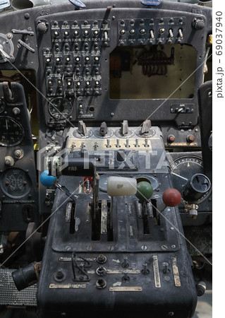 Broken dashboard of an abandoned old propeller plane 69037940