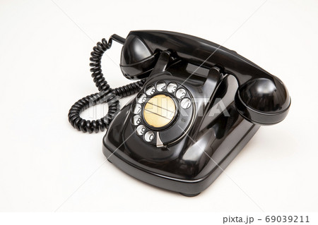 昭和レトロの黒電話2種の写真素材