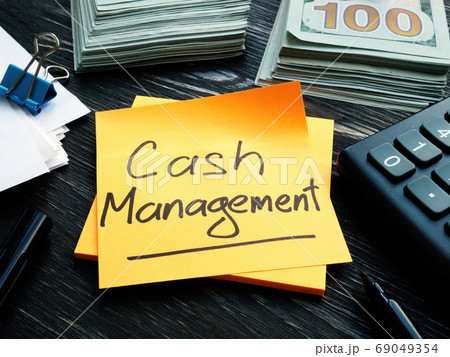 Cash management handwritten inscription and money. 69049354