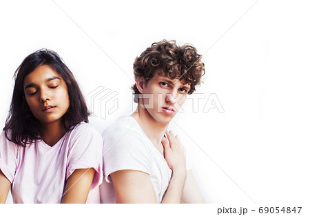 best friends teenage girl and boy together having fun, posing emotional on white background, couple happy smiling, lifestyle people concept, blond and brunette multi nations 69054847