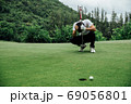 Golfer stress and sit on the golf course. failure idea concept. 69056801