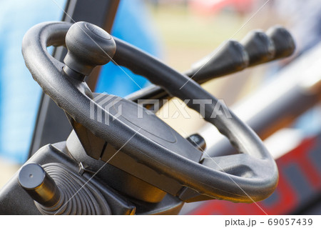 Steering wheel and operating control levers in forklift, tractor or other industrial machine Steering wheel and operating control levers in forklift, tractor or other industrial machine 69057439
