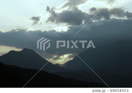 View of a beautiful bright sunset high in the mountains. selective focus. 69058423