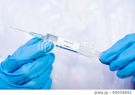 Doctor, scientist, researcher hand in blue gloves 69058892