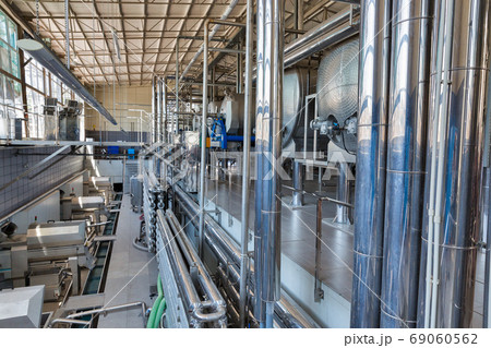 Stainless steel equipment for wine at modern winery. Stainless steel equipment for wine at modern winery. 69060562