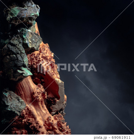 Stones and wood on a background of a cloudy sky. 69061911